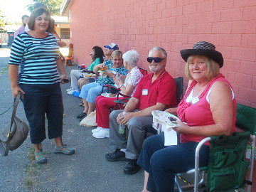 Neighbors enjoying the food at the North City Summer Picnic