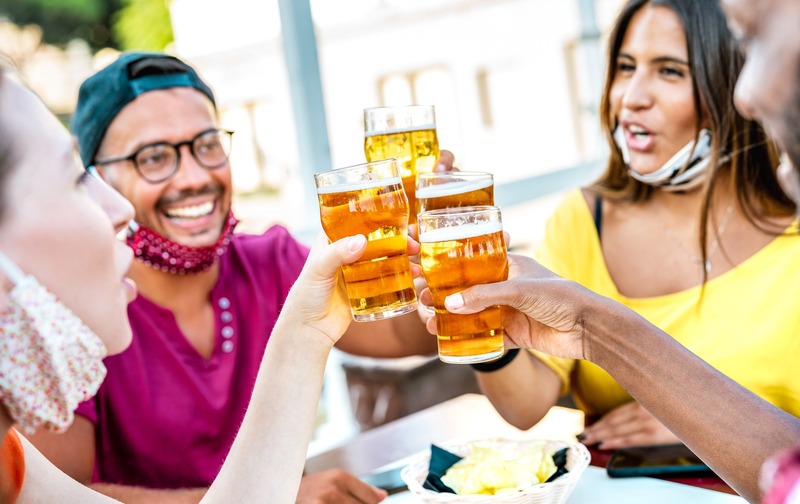 photo of people socializing (with beer)